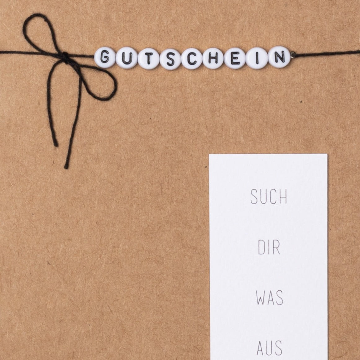 Buchstabenperlenkarte "Gutschein" - Räder