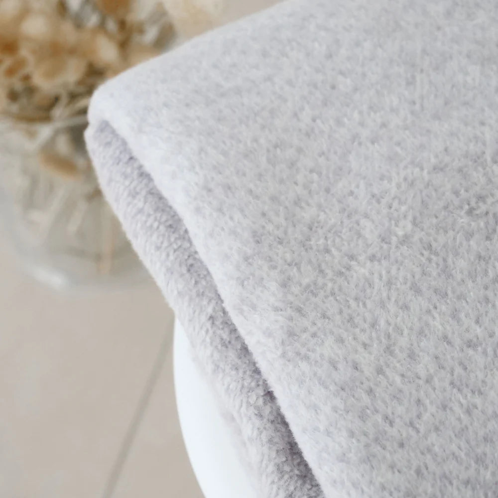 Kuscheldecke "Emma" grau meliert - Riema