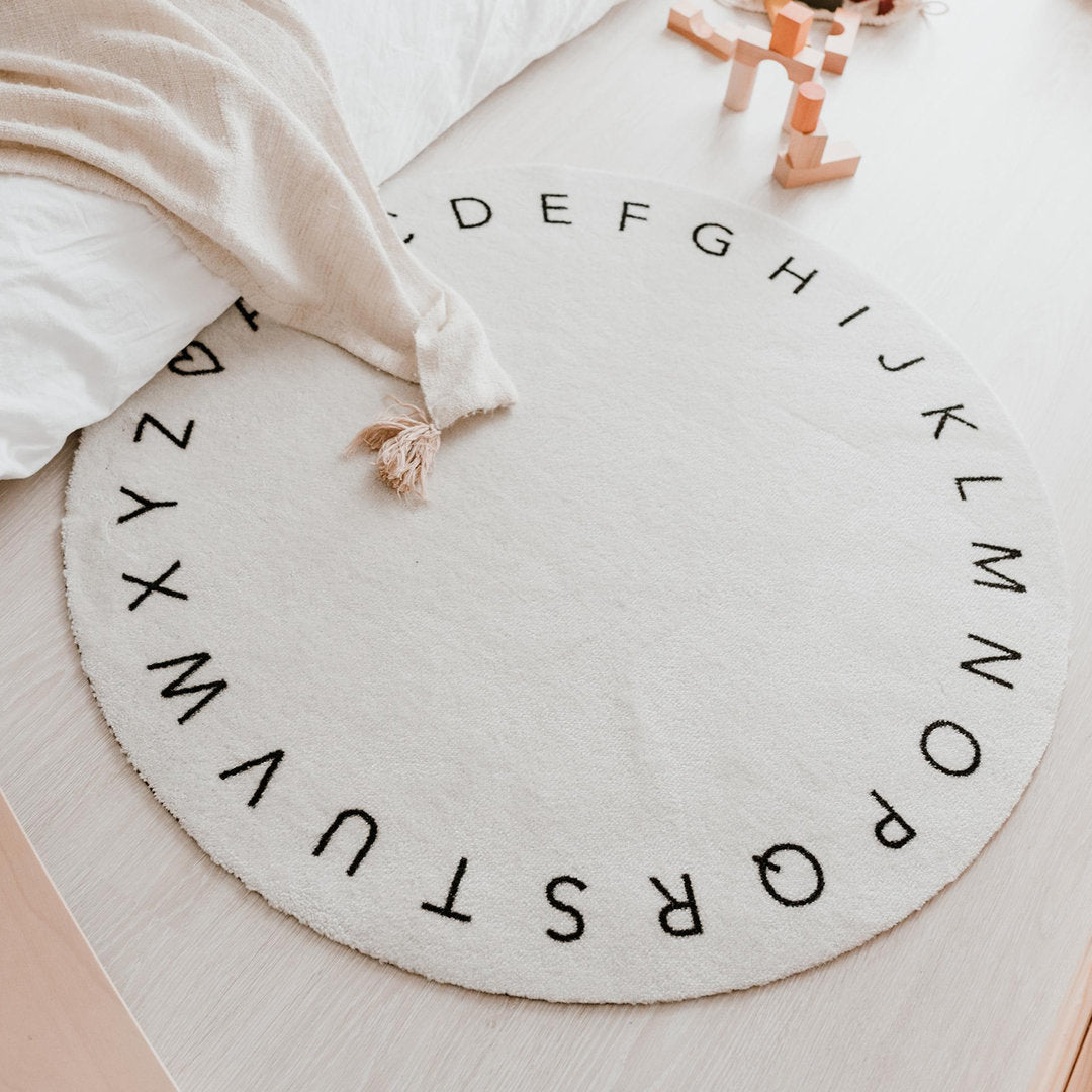 Waschbarer Kinderteppich "ABC" - Eulenschnitt